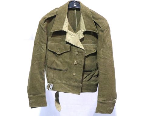 British WWII olive battledress, dated 1943 and named to SGT P F Barron, some moth holes to arms. P&amp;P Group 2 (£18+VAT for