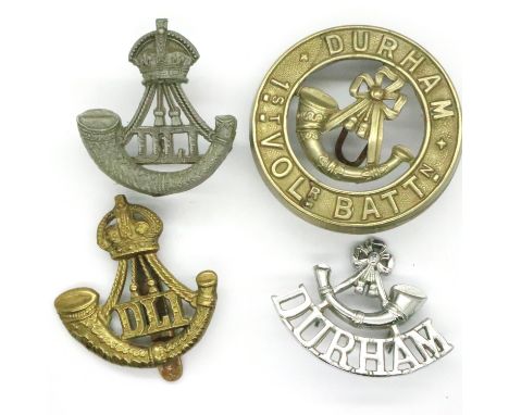 Durham Light Infantry: four cap badges including 1st Volunteer Battalion. P&amp;P Group 1 (£14+VAT for the first lot and £1+V