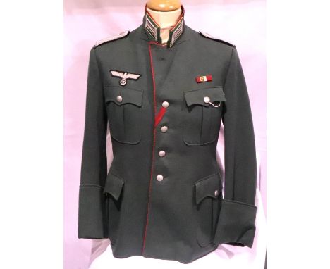 German WWII Artillery Leutnant tunic, deep red piping with later embroidered eagle, approximate size 38 chest. P&amp;P Group 