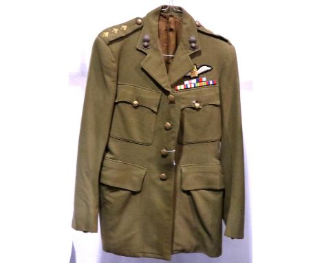 Royal Artillery dress tunic, badged with pilots wings to the rank of captain, with medal ribbons including Military Cross, pr