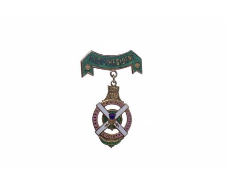 SILVER AND ENAMEL MEDALfor the Ealing & District Scottish Society, with central enamelled thistle on a Saltire cross, suspend