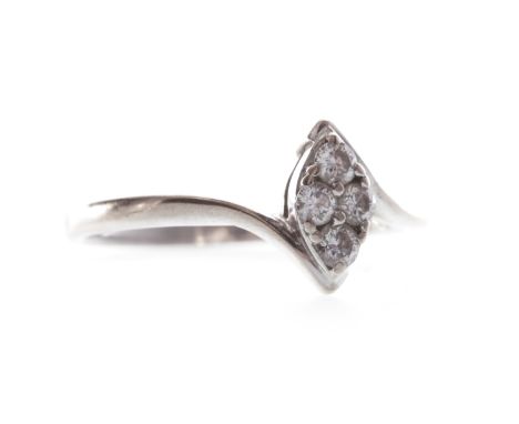DIAMOND CLUSTER RINGwith a marquise shaped bezel set with round diamonds totalling approximately 0.20 carats, in eighteen car
