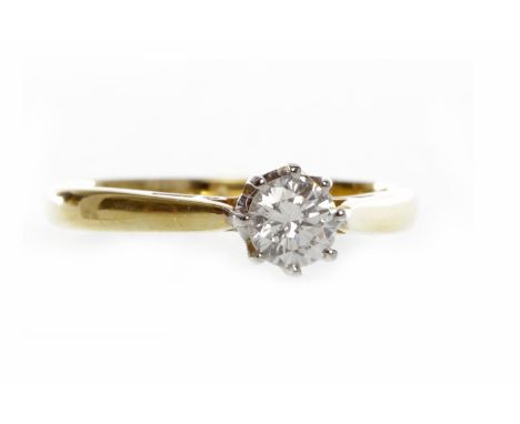 EIGHTEEN CARAT GOLD DIAMOND SOLITAIRE RINGset with a round brilliant cut stone of approximately 0.27 carats, size K, 2.5g