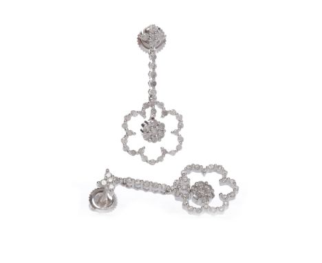 PAIR OF DIAMOND DROP FLORAL CLUSTER EARRINGSeach with a flower motif drop set with round brilliant cut diamonds, with a furth