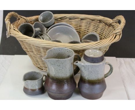 Studio pottery tea and dinner service in wicker basket (18 pieces)