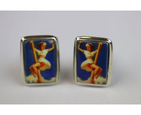 Pair of silver and enamel cufflinks