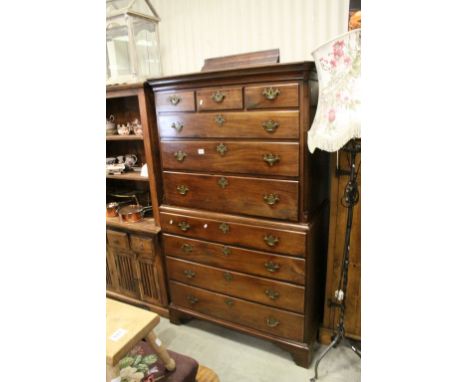 George III Mahogany Chest on Chest with Three Short Drawers over Seven Long Drawers, brass inlaid canted upper section, brass