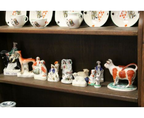 Collection of vintage Staffordshire ceramic figures etc to include a Cow Creamer, Lurcher with Rabbit in mouth, spill Vase et