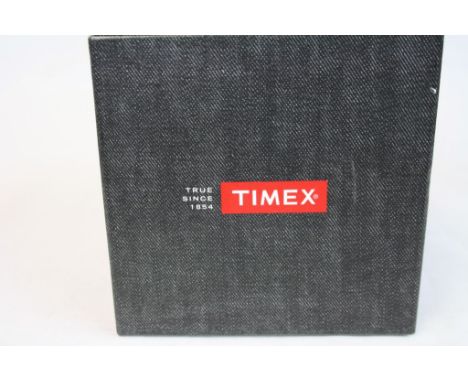 Boxed gents Timex activity tracker watch - model M372 with space strap and book 