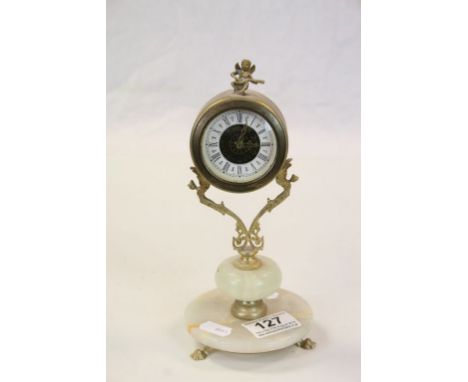Alabaster &amp; Gilt metal mantle Clock with Cherub playing Guitar finial, stands approx 21.5cm