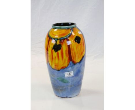 Large Poole Pottery vase with bright abstract Floral decoration and raised Dolphin mark to base, stands approx 33cm