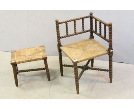 19th / Early 20th century Oak Bobbin Support Corner Chair with Rush Seat together with an Oak Bobbin Support Stool with Rush 