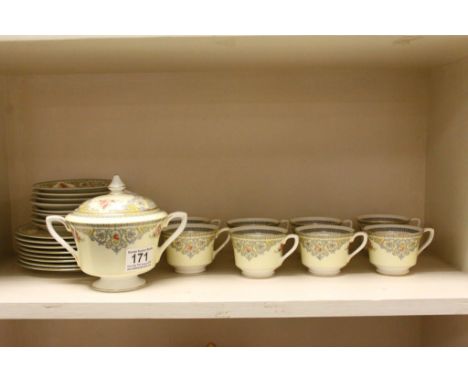 Royal Worcester part Tea service in "The Countess", comprising eight cups &amp; saucers, side plates and a covered Sugar bowl