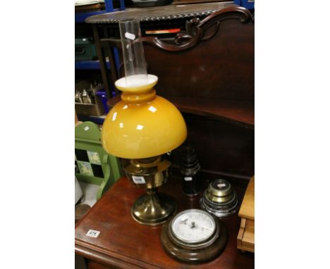 Brass Oil Lamp with Amber Glass Shade together with Three Paperweights made from parts from British Insulated Callender's Cab