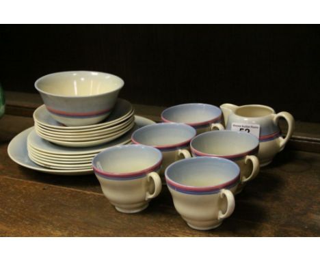 Clarice Cliff Newport Pottery part tea service, Art Deco period to include cups, saucers, side plates, cream jug etc