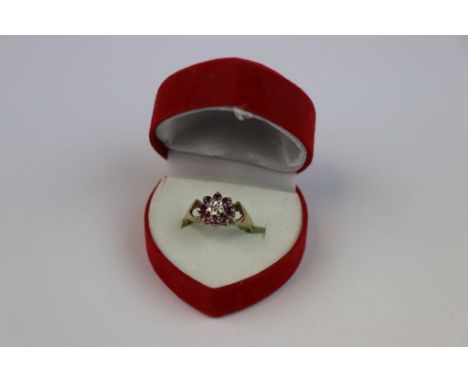 9CT Yellow Gold ruby and diamond cluster ring 