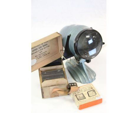 Vintage slide projector made by Gnome with two boxes of slides 