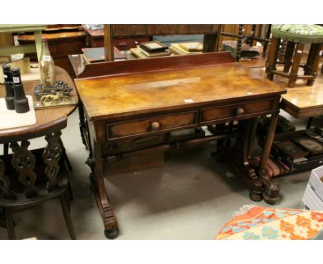 Victorian Mahogany Pugin Style Gothic Design Side Table with Two Drawers raised on shaped legs and sledge bases with bun feet