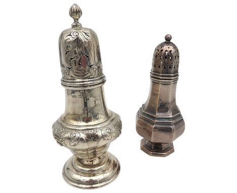 A STERLING SUGAR CASTER, tapered baluster form, with floral scroll repousse decoration to the waist and lid, the lid surmount