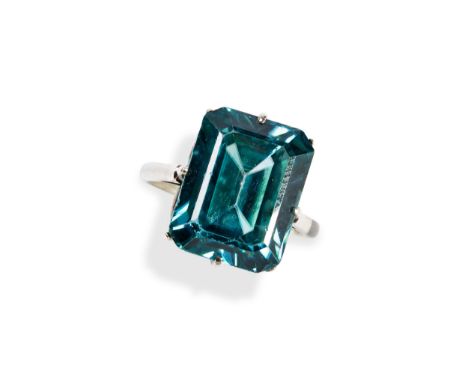 A 20TH CENTURY&nbsp;BLUE ZIRCON RING the emerald-cut, cut cornered zircon eight claw to a pierced gallery, to a straight shan