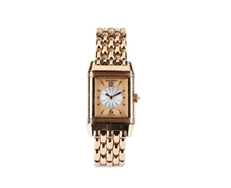 JAEGER LE COULTRE: AN 18CT YELLOW GOLD AND DIAMOND SET LADIES DUETTO REVERSO WRISTWATCH ref. 266.2.44, case no 1890925; mothe