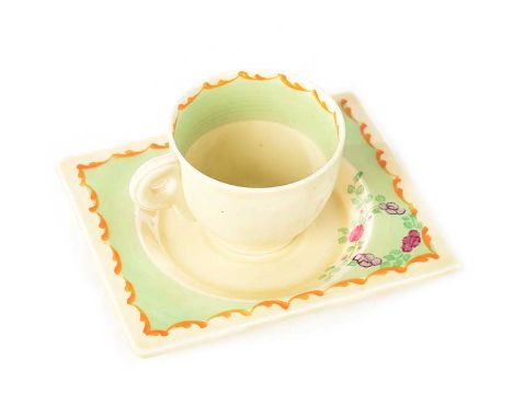CLARICE CLIFF BIARRITZ WILKINSON LIMITED CUP AND SAUCER.CIRCA 1945.CUP HEIGHT: 2½ INCHES.SAUCER: 6 X 5 INCHES. IN GOOD CONDIT