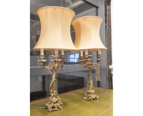 TABLE CANDELABRA, a pair, of French style gilt metal, five light, electrified, each 83cm H including shades. (2)