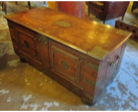TRUNK, early 19th century Dutch East Indies padouk and brass bound with a rectangular rising top and a handle to each side on