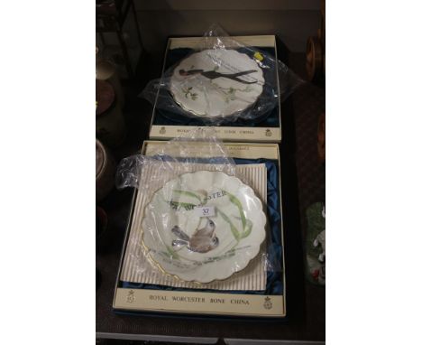 Two Royal Worcester hand painted desert plates 'The Birds of Dorothy Doughty' with original boxes 