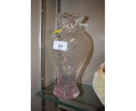 A Caithness glass vase with pink swirl decoration