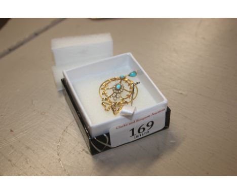 A 9ct gold pendant set with seed pearl and turquoise stones 