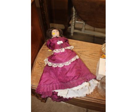 A bisque headed doll