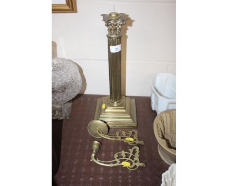 A brass Corinthian column table lamp base; and two brass sconces 