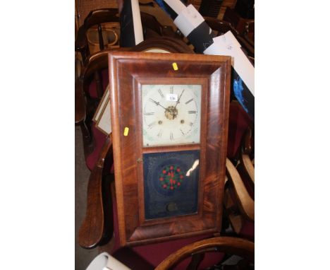 A 19th century American two hole wall clock 