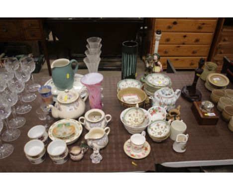 A pink art glass vase; a Royal Doulton bunnykins bowl; Royal Worcester ramekins; Mintons teacups and saucers; a figural decor