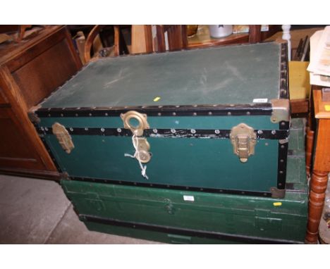 A metal bound travelling trunk