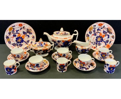 An early 19th century tea set, probably Coalport, teapot, sucrier and milk jug, assorted cups, saucers, two plates, painted i