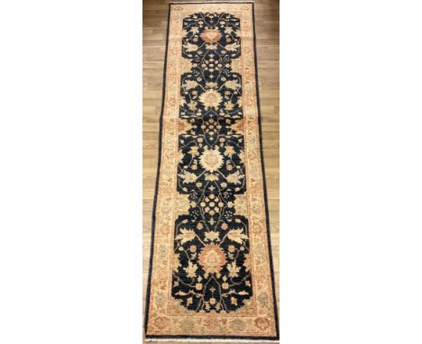 A Ziegler hand made carpet runner, 302cm x 83cm 