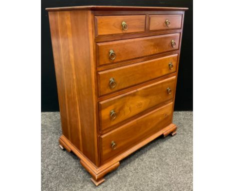 A Stickley brothers cherry wood chest of drawers, two short over four long graduated drawers, bracket feet, stamp mark ‘Stick