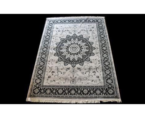 A Large Woven Silk Carpet Keshan rug with grey ground and black and grey border traditional Middle Eastern floral and foliate