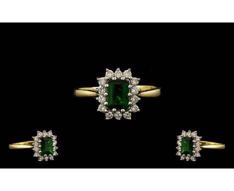 18ct Gold Attractive Green Tourmaline and Diamond Set Dress Ring, The Central Step Cut Tourmaline of Excellent Colour, Surrou