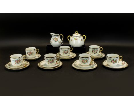 A Japanese Lustre Part Tea Service Comprising twin handle sugar bowl, milk jug, cake plate and six cups with matching saucers