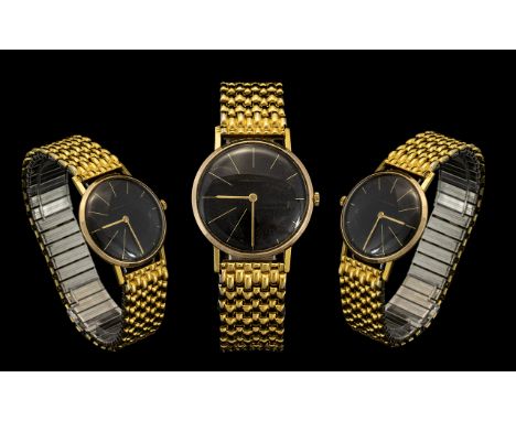 Gents 9ct Gold Round Cased Mechanical Wind Wrist Watch with Black Dial and Gold Markers, Seconds Sweep. Temperature Adjusted 