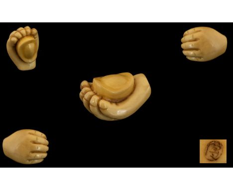 Oriental Netsuke in the Form of an Open Hand. Signed to base. Length 1.5 inches.