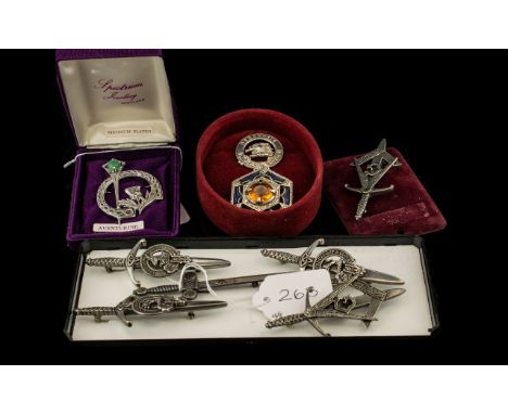 Collection of Scottish Clan Related Jewellery comprising a Clan Bethune/Macbeth white metal badge, six various Gaelic Themes 