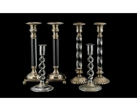 Three Sets of Silver Plated Candlesticks the first with glazed stems on a square base, the second with barley twist and the t