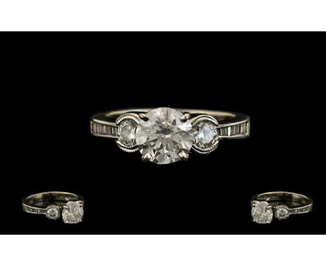 Ladies 18ct White Gold Diamond Set Dress Ring, The Centre Round Brilliant Cut Diamond Measure 6.74 x 6.70 x 4.7 mm. 1.24 cts.