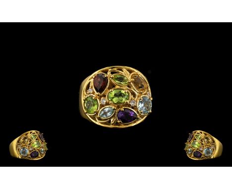 Multi Gemstone Cluster Ring, comprising peridot, amethyst, citrine, garnet, blue topaz and white topaz, in a variety of cuts,