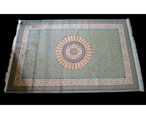 A Large Woven Silk Carpet Abusson rug with green ground and  with traditional floral and foliate border detail with central s