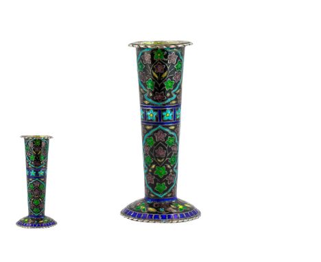 An Enamel on Silver Tapering Specimen Vase floral decoration throughout on a black ground with shaped rim and foot. Height 3.